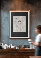 A framed minimalist art print featuring a beige and black line drawing of 2 women in a brown frame on a distressed gray wall.