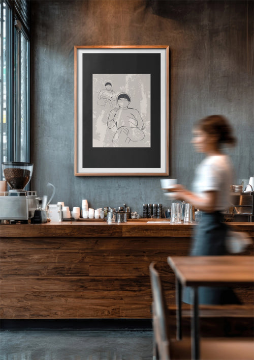 A framed minimalist art print featuring a beige and black line drawing of 2 women in a brown frame on a distressed gray wall.