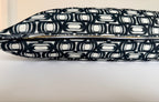 Black and white patterned tray on a light background