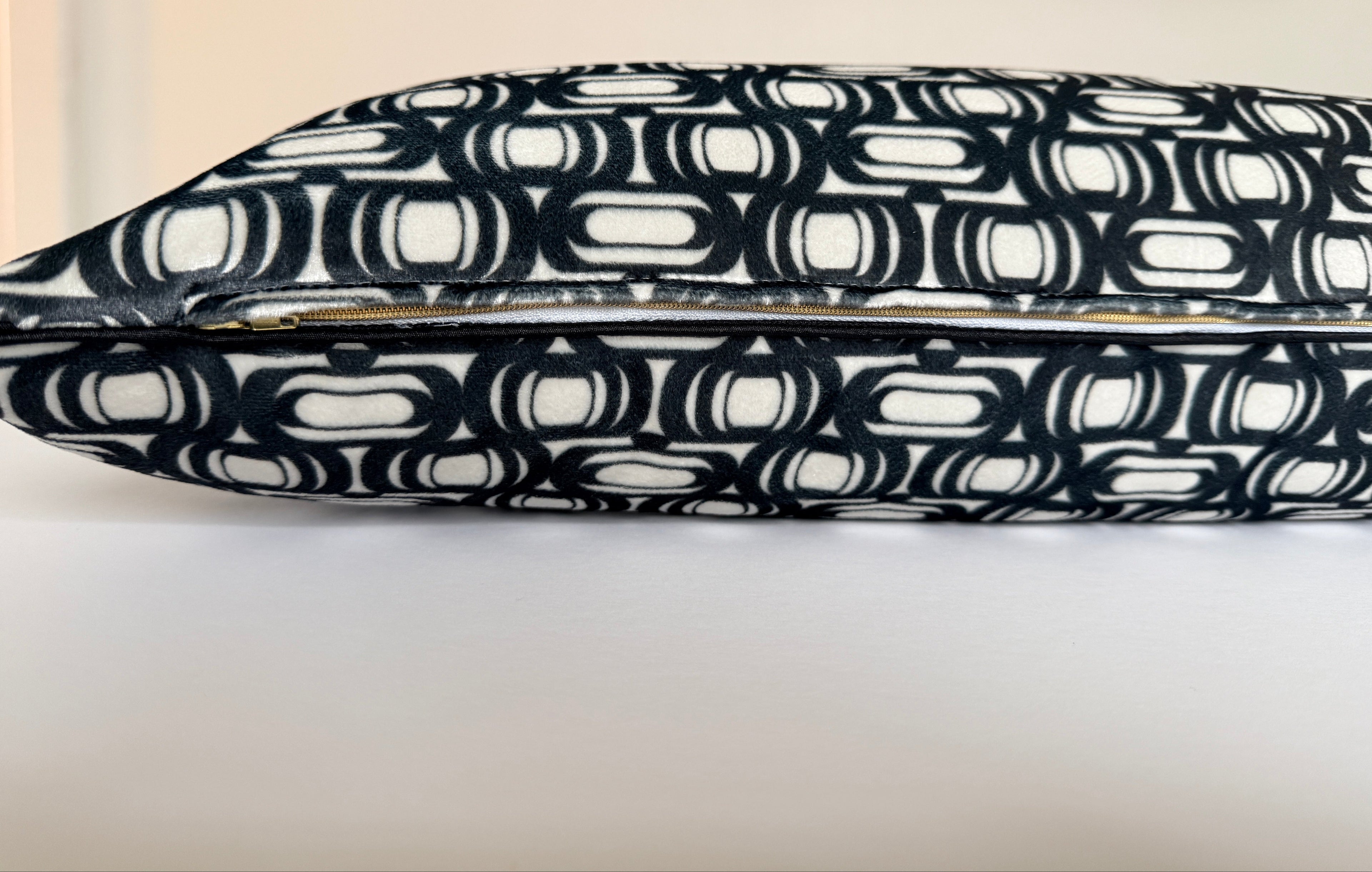 Black and white patterned tray on a light background